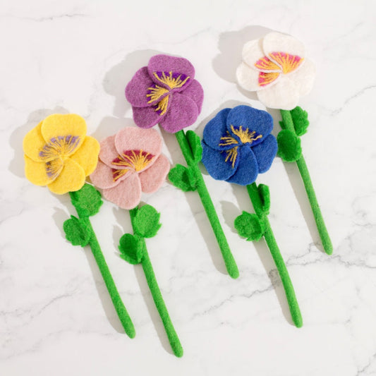 Felt Pansy flowers spaced out diagonally in yellow, pink, purple, blue, and white.