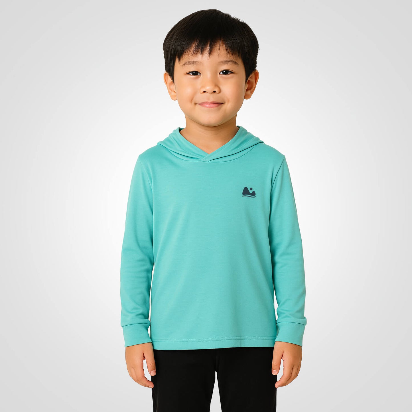 Boy wearing aqua blue colored sun shirt.
