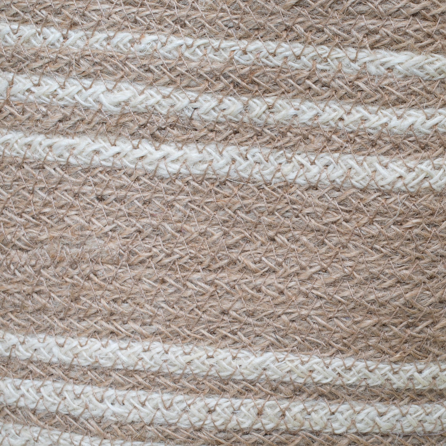 Closeup of Brown and white striped jute basket stripes.