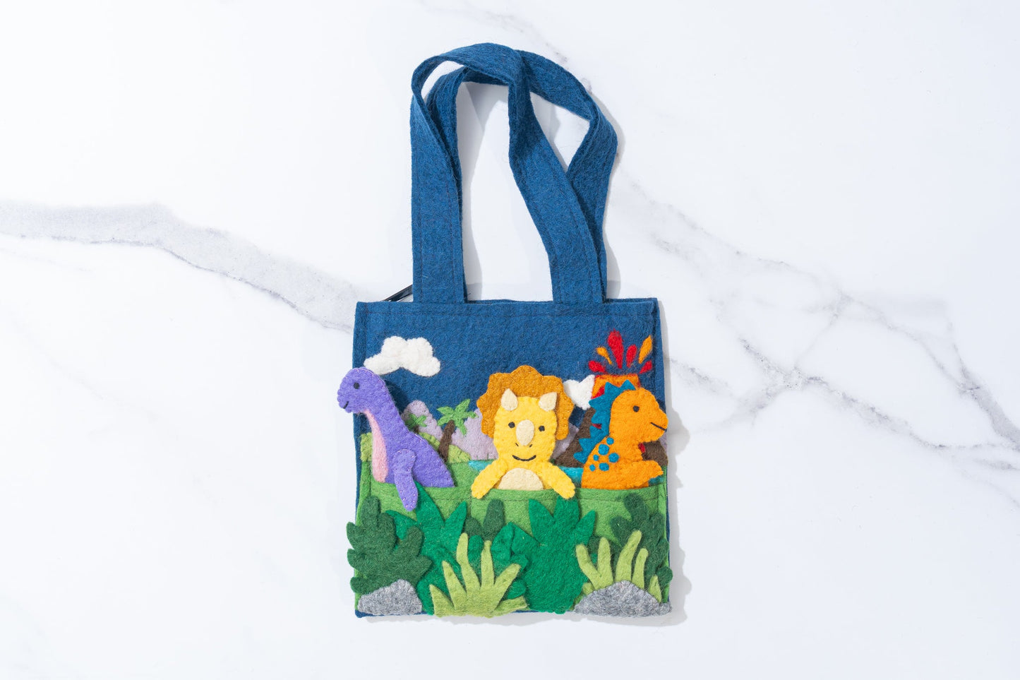 Fair trade felt children's tote bag with dinosaur puppets on a white background | Global Goods Partners
