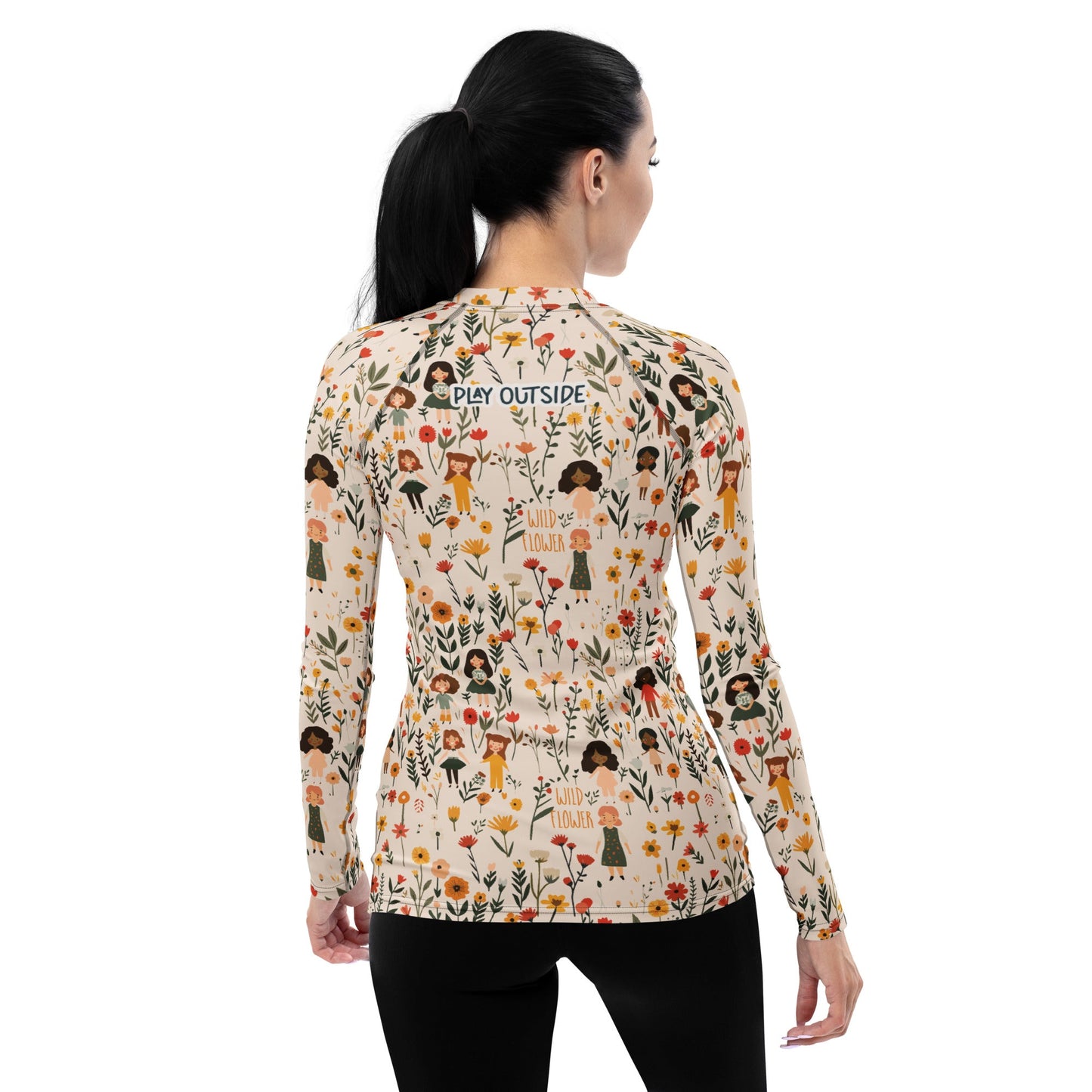 A floral-themed rash guard for women, made with sustainable materials and designed for hiking, swimming, or layering in cooler weather.