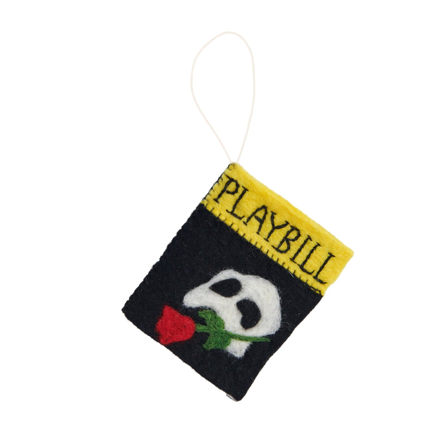 Felt ornament of a playbill for the Broadway play The Phantom of the Opera showing the white mask and red rose.