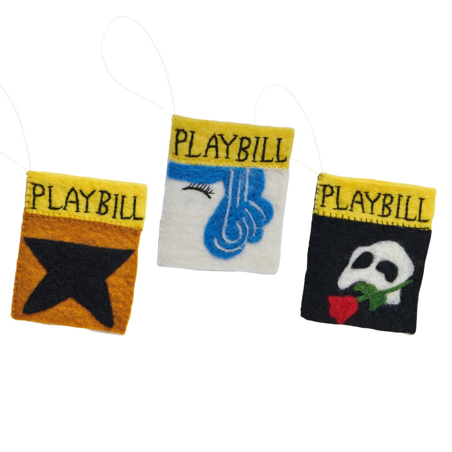 Felt ornaments of playbills for the Broadway shows Hamilton, Hairspray, and The Phantom of the Opera.