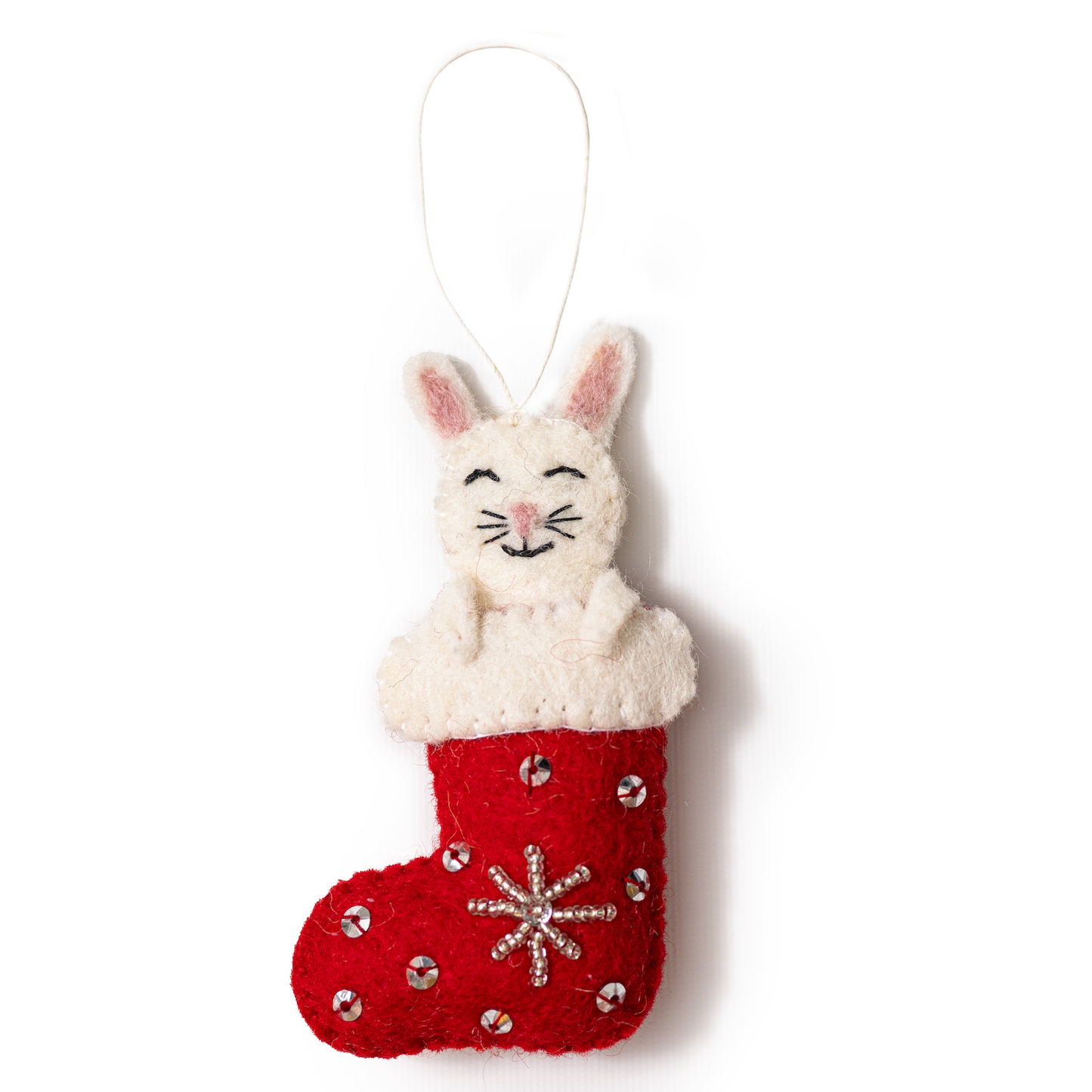 Felt ornament of a white bunny sticking out of a red and white Christmas stocking.