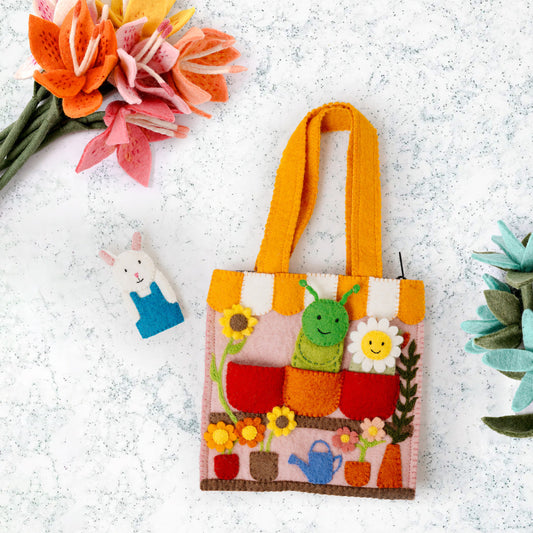 Felt flower shop puppet bag with removable flower, caterpillar and bunny felt finger puppets.