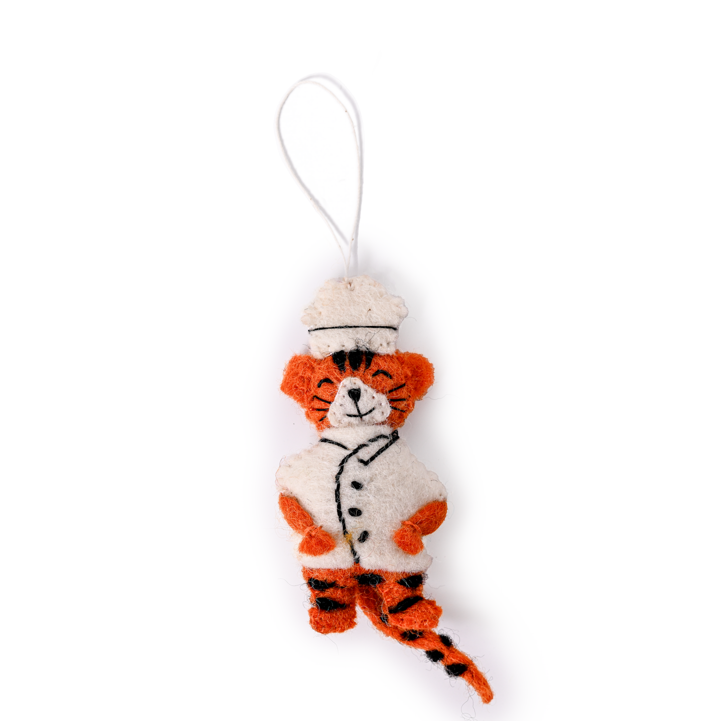 Felt ornament of a tiger in a chef's hat and coat.