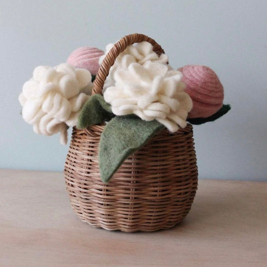 White felt Geranium flowers in small basket with other pink felt flowers.