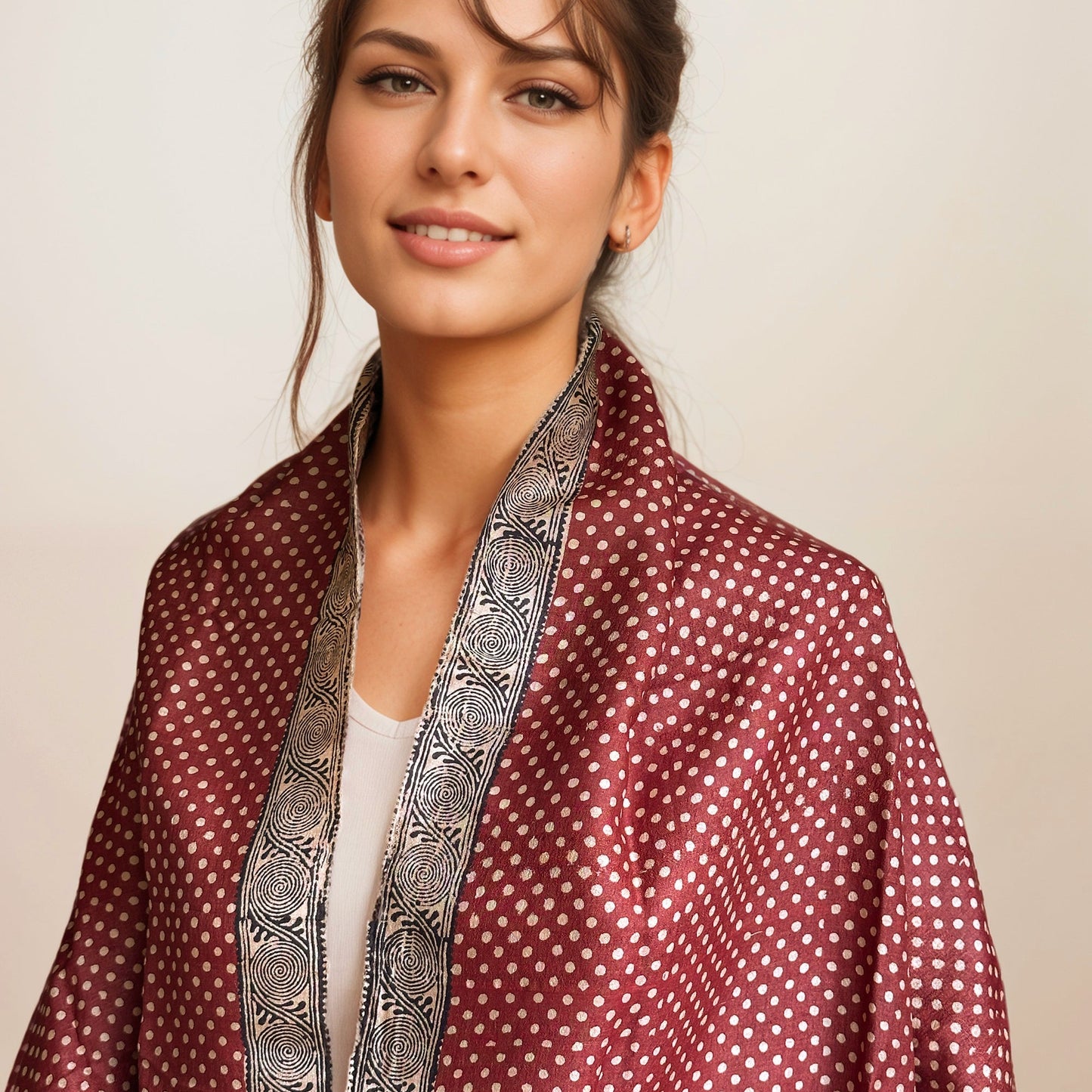 Woman wearing red, black, and natural scarf with natural polka dots.