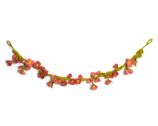 Felt garland of pink cherry blossoms and green leaves.