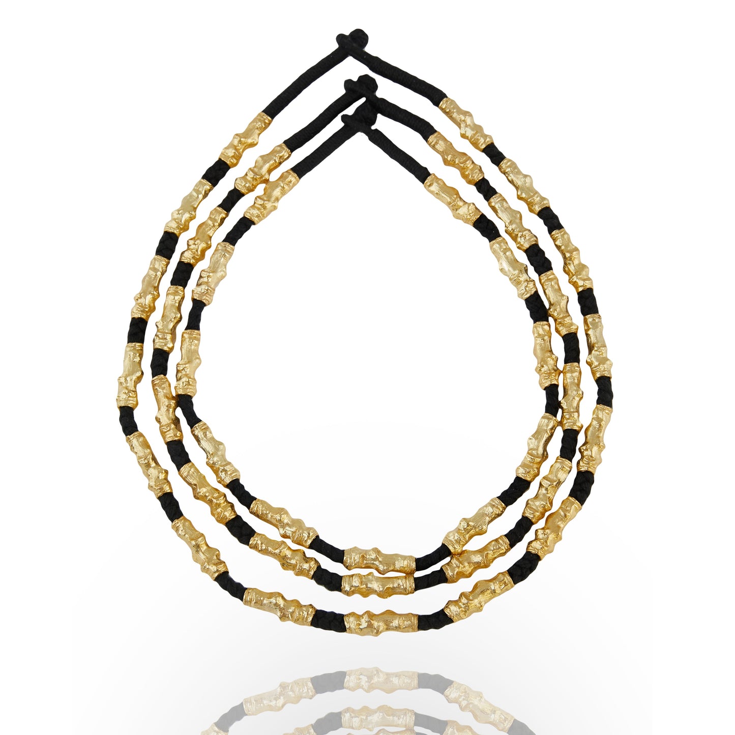 stacked gold plated and black thread necklace