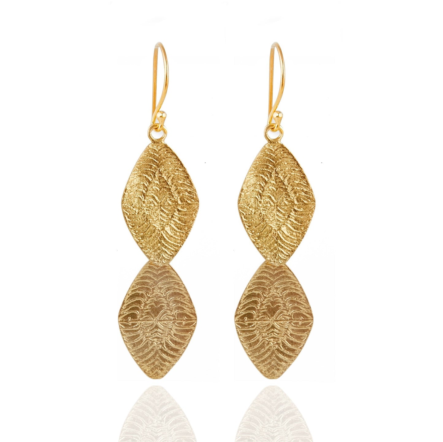 Pair of diamond shaped gold earrings.