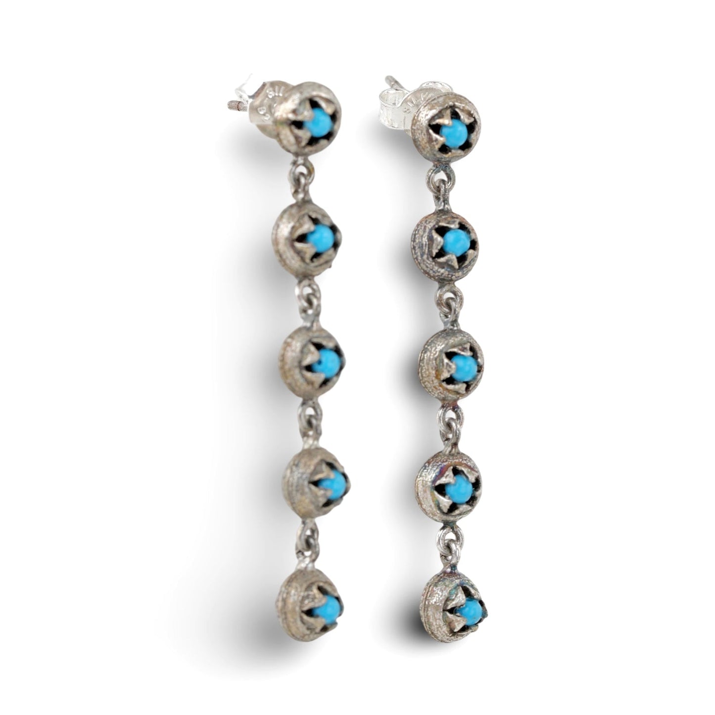 Pair of gold dangle earrings with five discs each and turquoise glass in each disc.