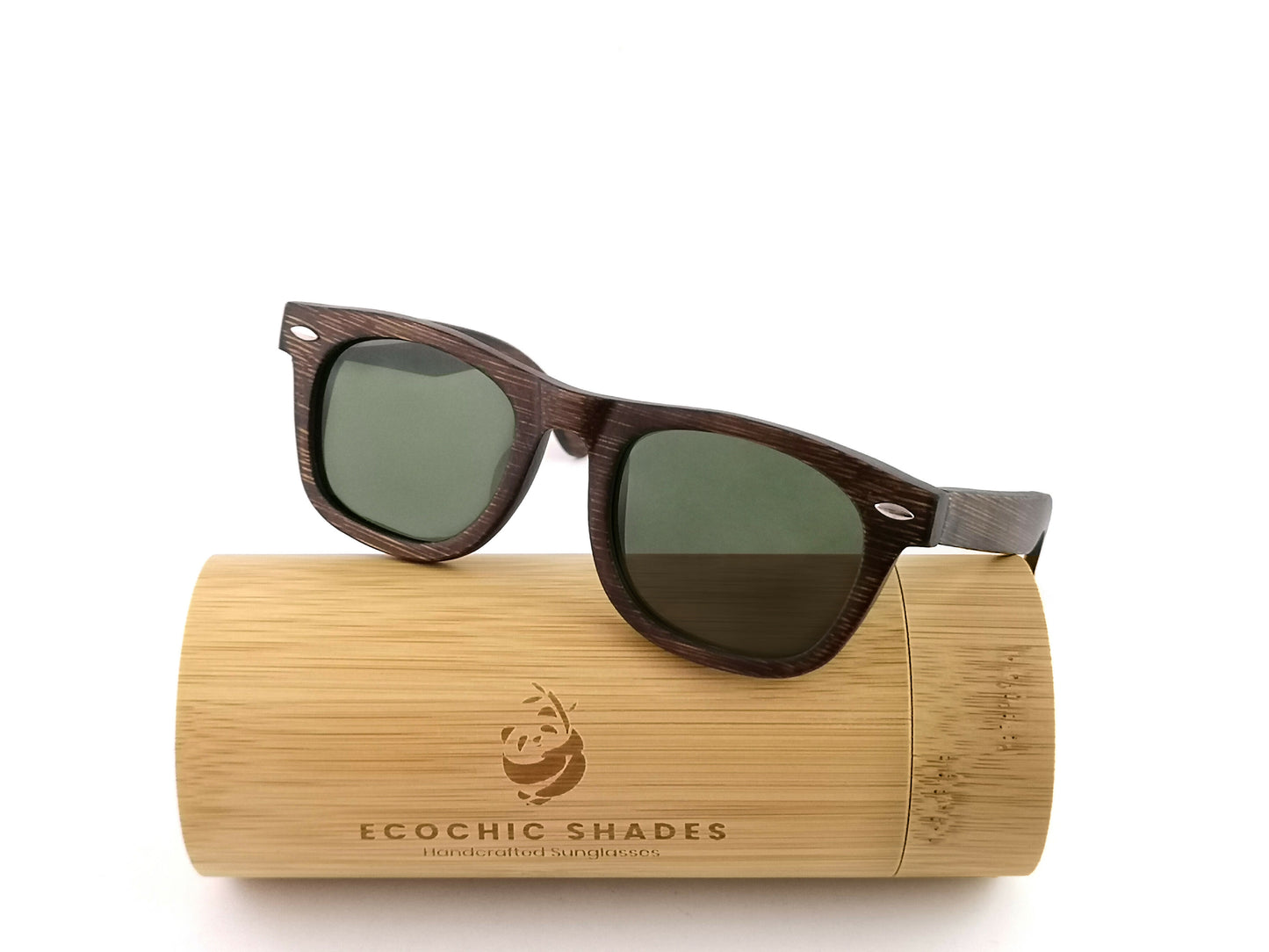 Bamboo wayfarer style sunglasses with brown frames and grey lenses on a bamboo cylindrical case.