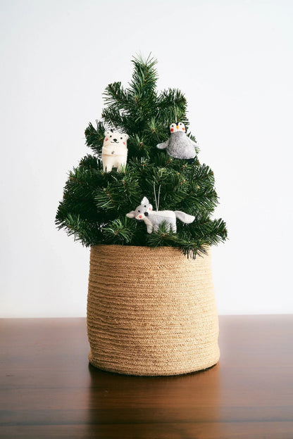 Mini Christmas tree with ornaments of felted wool arctic animals.