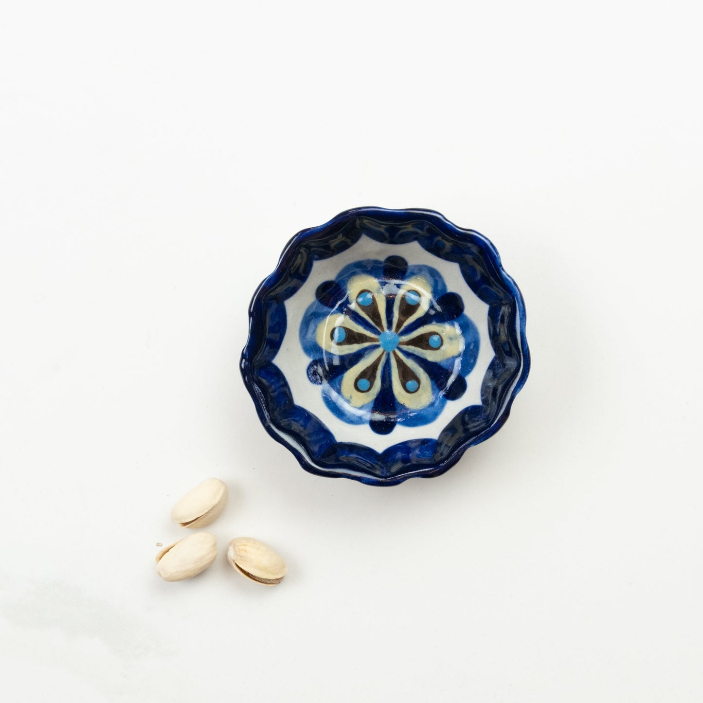 Blue and white painted round tapas bowl.