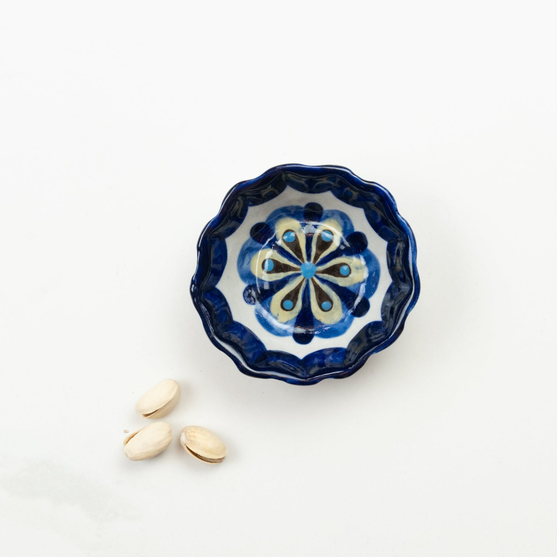 Blue and white painted round tapas bowl.