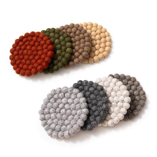 Felt circle coasters in red, green, brown, yellow, and various shades of grey.