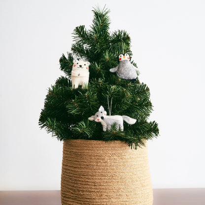 Mini Christmas tree with ornaments of felted wool arctic animals.