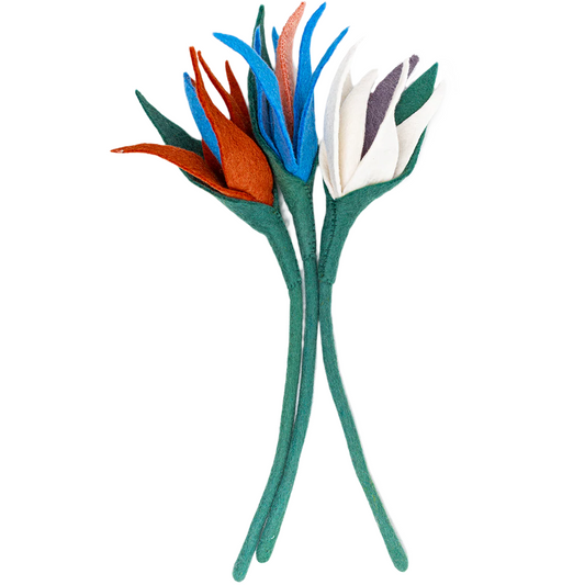 Bunch of felt Bird of Paradise flowers in orange, blue, and white.