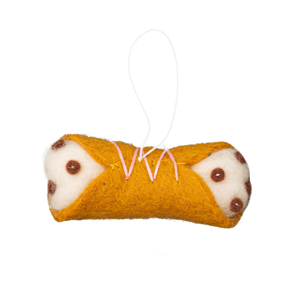 Felt ornament of a cannoli Italian dessert.