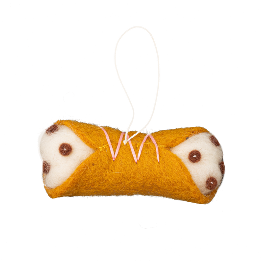 Felt ornament of a cannoli Italian dessert.
