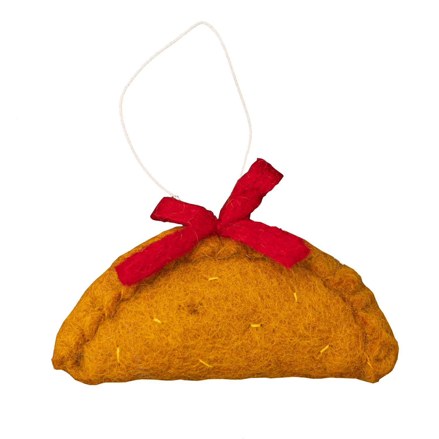 Felt ornament of an empanada with a red bow on top.