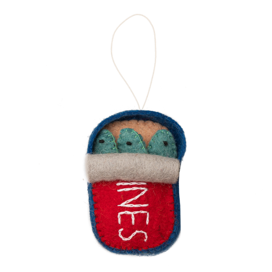 Felt ornament of a can of sardines half open showing three fish.