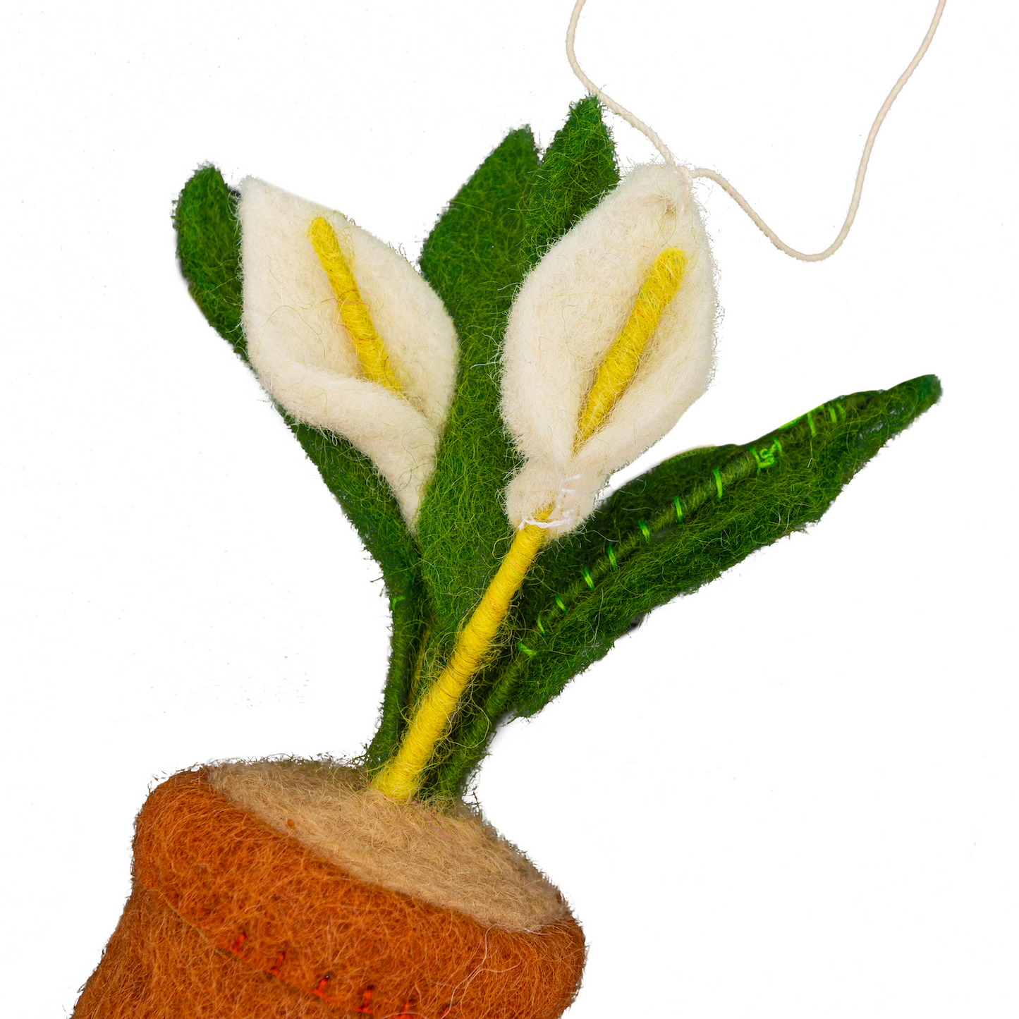Felt ornament of a Peace Lily plant with white flowers in a brown pot.