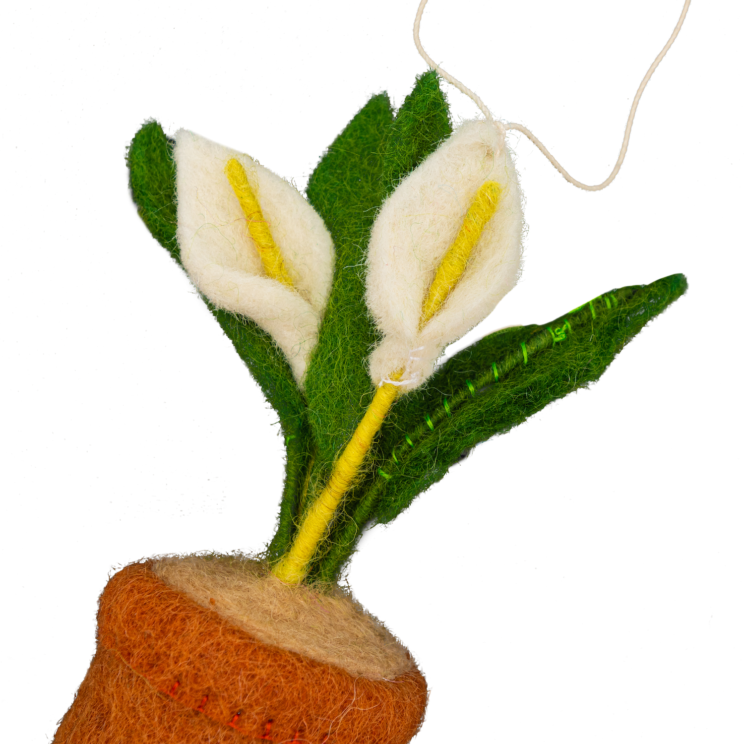 Felt ornament of a Peace Lily plant with white flowers in a brown pot.