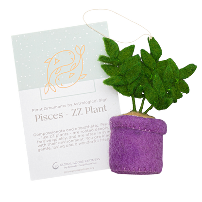 Felt ornament of a ZZ plant in a purple pot with a Pisces astrology card.