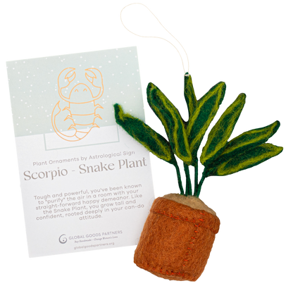 Felt ornament of a Snake Plant in a brown pot with a Scorpio astrology card.