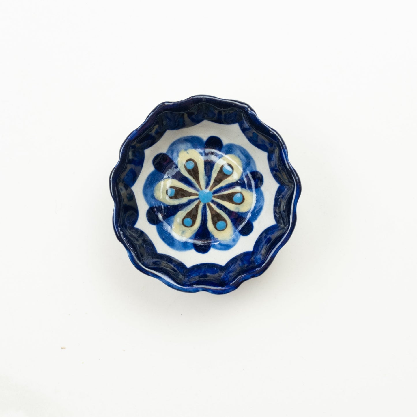 Blue and white painted round tapas bowl.
