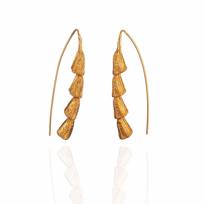 Pair of gold plated dangle earrings.