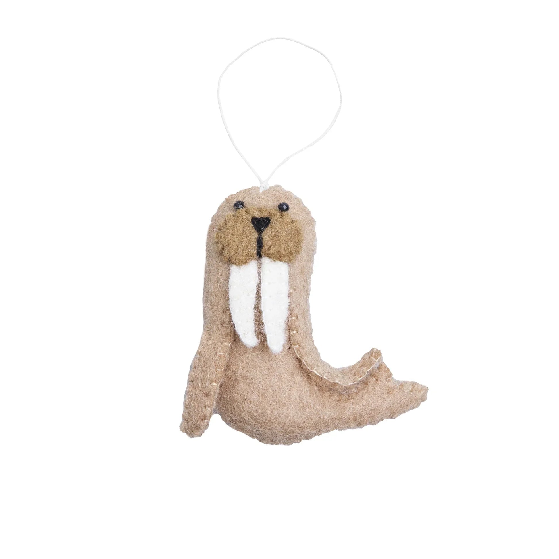 Felted wool ornament of a brown walrus.