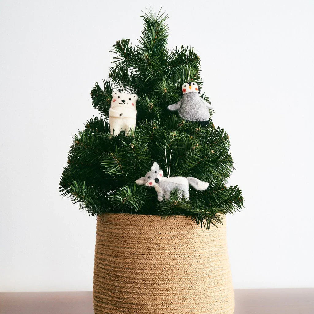 Mini Christmas tree with ornaments of felted wool arctic animals.