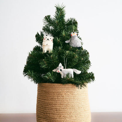 Mini Christmas tree with ornaments of felted wool arctic animals.