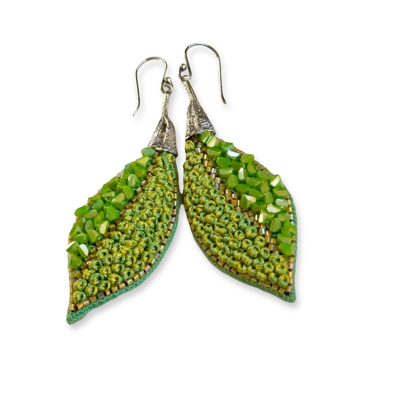 Pair of leaf shaped green glass bead earrings with silver findings.