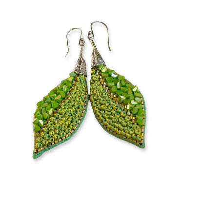 Pair of leaf shaped green glass bead earrings with silver findings.