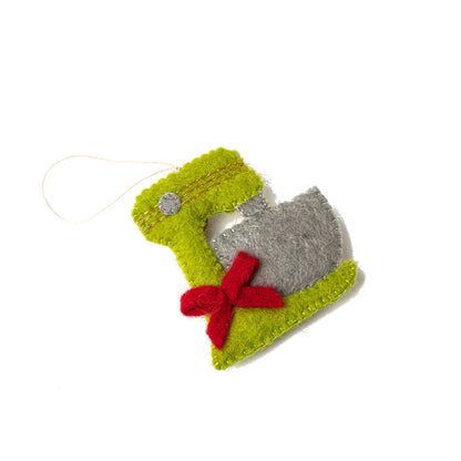Felt ornament of a light green mixer with a red bow.