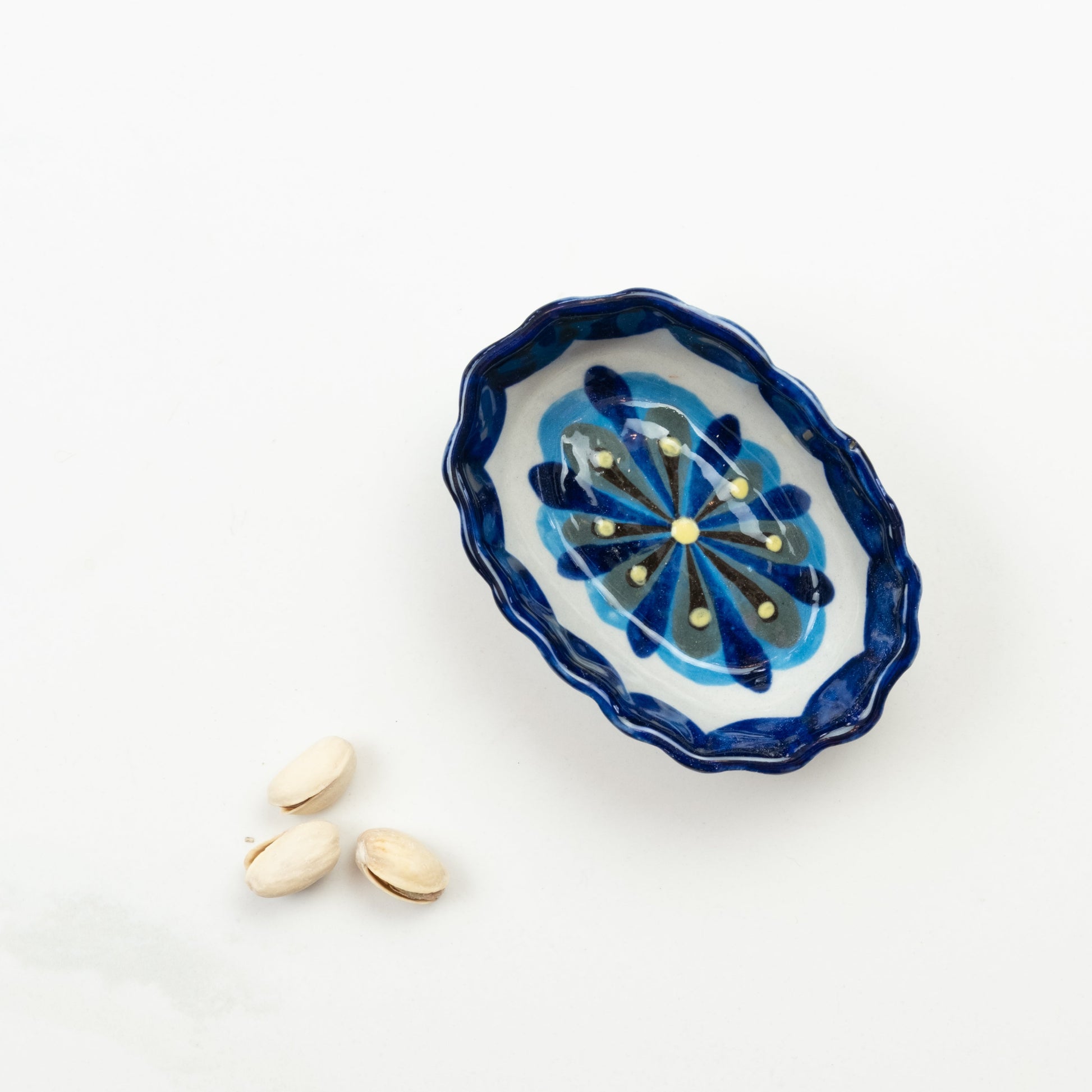 Blue and white painted oval tapas bowl.