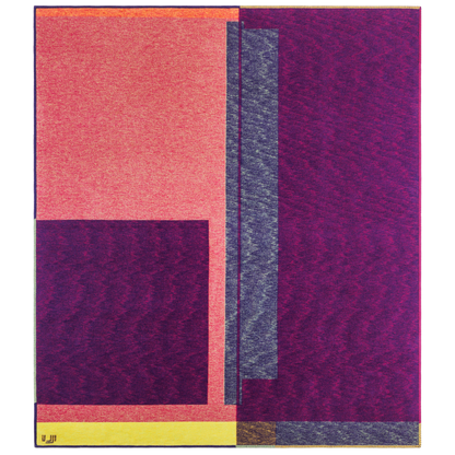 Blanket in bright purple, yellow, pink, and orange asymmetrical designs.