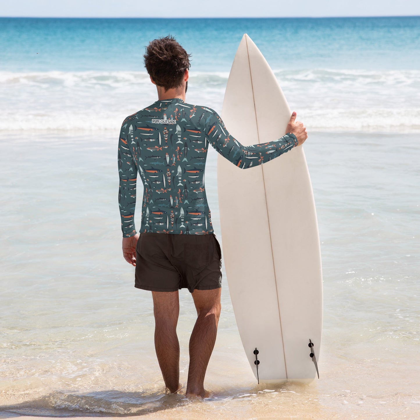 A men’s rash guard featuring vibrant fish patterns, made with sustainable, moisture-wicking fabric for outdoor adventures. Family matching