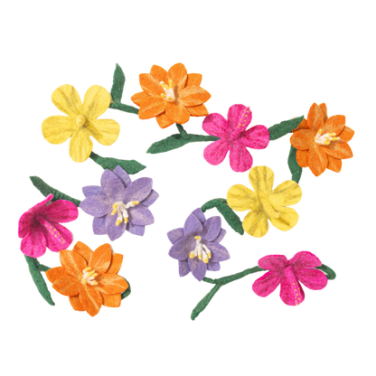 Handmade colorful floral garland on a white background fair trade and made by Nepali artisans | Global Goods Partners