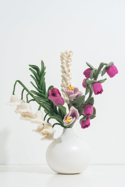 White vase with felt flowers on a white background, fair trade and made in Nepal | Global Goods Partners
