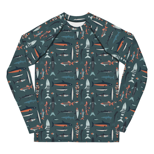 A colorful fish-print rash guard for kids, with bright aquatic designs on a sea-blue background, shown from the front.