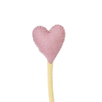 Close up of felt heart accent stem in pink.