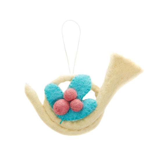 Felt ornament of a French Horn with a sprig of holly and berries.