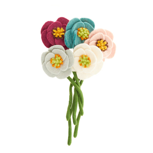 Bouquet of felt poppy flowers in magenta, blue, pink, white, and light blue.
