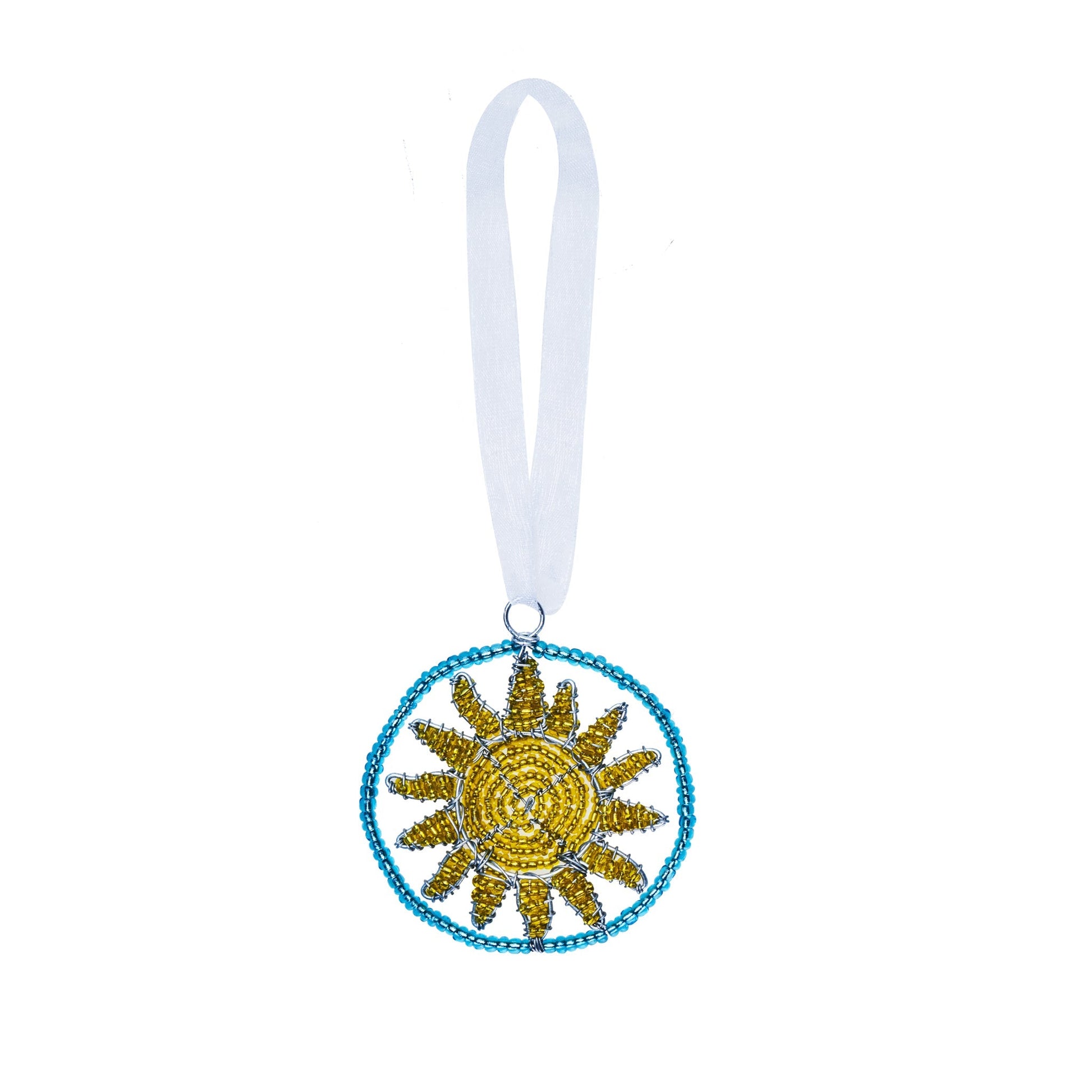 Beaded ornament of a yellow sun in a blue circle.