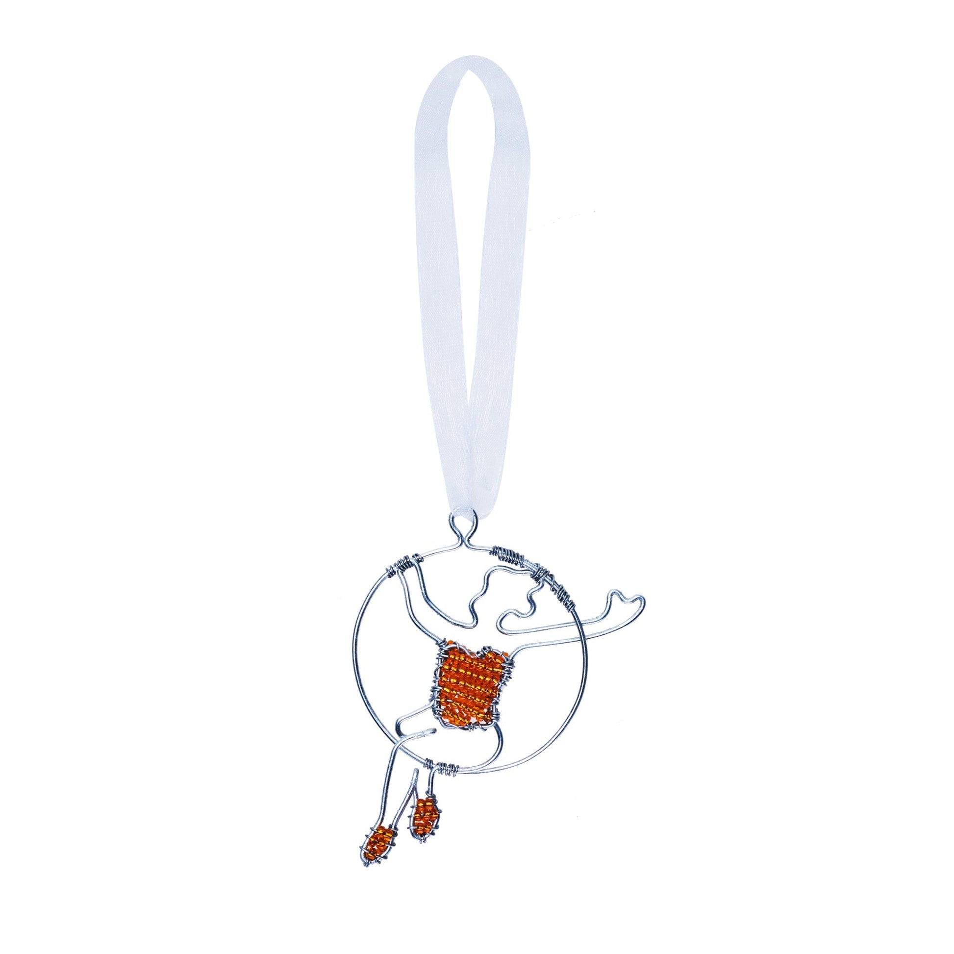 Wire and bead ornament of a woman swinging on a circus/aerial hoop in a red top and red shoes.